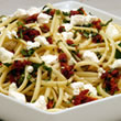 Pasta with Fresh Goat Cheese, dried tomatoes and basil